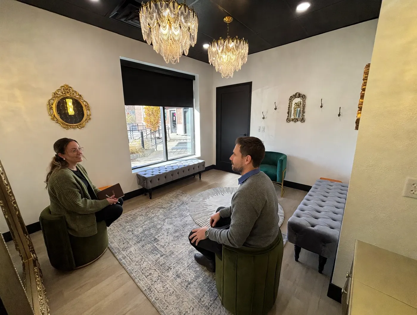 Two people in a private meeting nook at The Hive